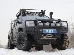 Бампер передний без кенгурина с местами под интегрированную оптику Nissan Navara